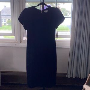 Calvin Klein black below knee dress with gold zipper on back